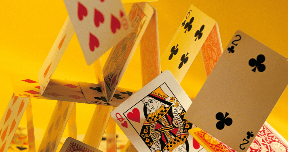 deck of cards on a yellow background
